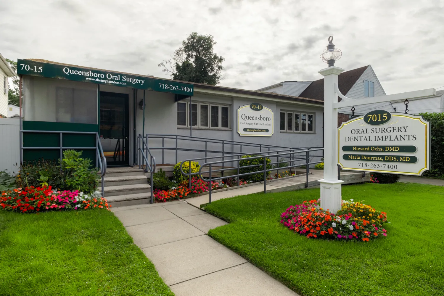 Front entrance and signage of Queensboro Oral Surgery in Fresh Meadows, NY