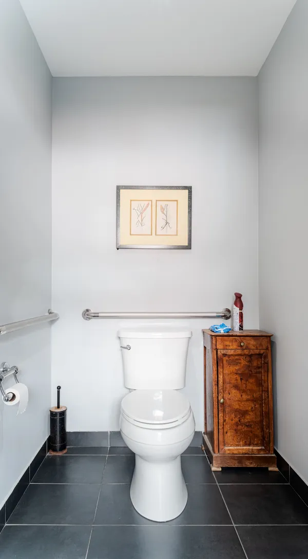 Accessible patient restroom with grab bars
